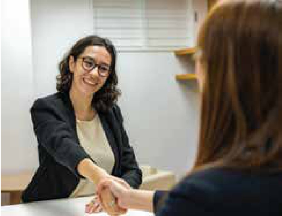 A professional handshake during an interview